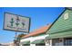 Exterior view of the Home Grown restaurant with its recognizable sign, green trim, and orange roof at 1076 Manigault Se St, Atlanta, GA 30316