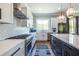 Modern kitchen with a large island, sleek appliances, and ample counter space at 1076 Manigault Se St, Atlanta, GA 30316