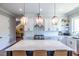Beautiful kitchen with a large center island, modern appliances, and pendant lighting at 1076 Manigault Se St, Atlanta, GA 30316