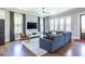 Comfortable living room features hardwood floors, large windows, and a stylish seating area at 1076 Manigault Se St, Atlanta, GA 30316