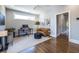 Cozy living room features a work space with a desk, chair and a leather loveseat at 1076 Manigault Se St, Atlanta, GA 30316