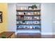 Chic living room with floating shelves, hardwood floors, and decorative accents at 1076 Manigault Se St, Atlanta, GA 30316
