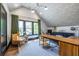 Attic office space featuring an angled ceiling, hardwood floors, and great natural light at 1076 Manigault Se St, Atlanta, GA 30316