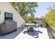 Outdoor kitchen features a dining area and stainless steel grill, ideal for entertaining or enjoying Gathering meals at 1076 Manigault Se St, Atlanta, GA 30316