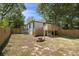 Wide shot of large backyard with deck and privacy fence at 1189 Gardenia Nw St, Atlanta, GA 30314