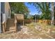 View of backyard with wooden deck, stairs, and fence for privacy at 1189 Gardenia Nw St, Atlanta, GA 30314