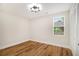 Bright bedroom with wood-look flooring and natural light at 1189 Gardenia Nw St, Atlanta, GA 30314
