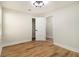 Bright bedroom with wood-look flooring and walk-in closet at 1189 Gardenia Nw St, Atlanta, GA 30314