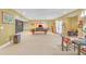 Basement area featuring a pool table, dining space, access to the backyard, and ample room for entertainment at 20 Balfour Dr, Covington, GA 30014