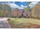 Charming brick home with manicured lawn and landscaping, offering great curb appeal at 20 Balfour Dr, Covington, GA 30014