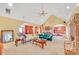 Spacious living room featuring brick fireplace, tall ceilings and comfortable seating at 20 Balfour Dr, Covington, GA 30014