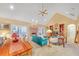 Open concept living room and dining area with vaulted ceiling and brick fireplace at 20 Balfour Dr, Covington, GA 30014