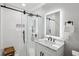Modern bathroom with a glass-enclosed shower and updated vanity at 2265 Starline Dr, Decatur, GA 30032