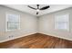 Bedroom with hardwood floors, ceiling fan, and windows at 2265 Starline Dr, Decatur, GA 30032