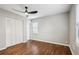 Bedroom featuring hardwood floors, a ceiling fan, and closet at 2265 Starline Dr, Decatur, GA 30032