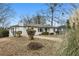Charming single-story home with a well-maintained lawn and a classic brick exterior at 2265 Starline Dr, Decatur, GA 30032