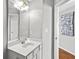 Powder room features a single sink and modern fixtures at 4606 Liberty Square Dr, Acworth, GA 30101