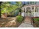 Picturesque community gazebo with brick steps, surrounded by mature trees and playground at 4606 Liberty Square Dr, Acworth, GA 30101