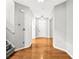 A bright foyer features hardwood floors, neutral walls and white trim at 4606 Liberty Square Dr, Acworth, GA 30101