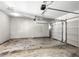 Spacious garage with unfinished floor at 4606 Liberty Square Dr, Acworth, GA 30101