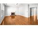 Bright living room with hardwood floors, a ceiling fan, and fireplace at 4606 Liberty Square Dr, Acworth, GA 30101