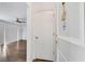 Bright entryway with hardwood floors and a white door, leading to a living space at 6851 Roswell Rd # A21, Sandy Springs, GA 30328