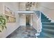 Elegant building lobby with a staircase, mailboxes, bulletin board, and tile flooring at 6851 Roswell Rd # A21, Sandy Springs, GA 30328