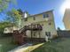Rear exterior featuring two story deck with stairs leading down to the yard at 6893 Spring Valley Ct, Douglasville, GA 30135