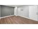 Spacious finished basement featuring durable flooring, neutral paint, and access to the exterior at 1261 Ashford Creek Ne Park, Brookhaven, GA 30319