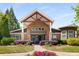 Beautiful clubhouse with stone facade, manicured landscaping, and a welcoming entrance at 1261 Ashford Creek Ne Park, Brookhaven, GA 30319