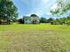 Sprawling backyard featuring lush green grass and a charming deck, perfect for outdoor gatherings at 1412 Brighton Pl, Loganville, GA 30052