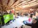 Spacious unfinished basement with exposed framing and ample storage space at 1412 Brighton Pl, Loganville, GA 30052