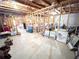 Unfinished basement with concrete floor and framed walls offering potential for customization at 1412 Brighton Pl, Loganville, GA 30052