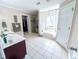 Elegant bathroom with double sinks, separate glass shower, and a luxurious soaking tub at 1412 Brighton Pl, Loganville, GA 30052