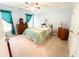 Cozy bedroom with bright windows and ceiling fan at 1412 Brighton Pl, Loganville, GA 30052