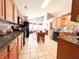 Well-equipped kitchen with stainless steel appliances, granite countertops, and a breakfast nook at 1412 Brighton Pl, Loganville, GA 30052