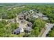An aerial view of the property showcasing a lovely residential area with community amenities and green spaces at 4208 Sierra Creek Ct, Hoschton, GA 30548
