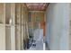 Framing for a bathroom shows a partially completed shower with plumbing and the initial construction phase at 4208 Sierra Creek Ct, Hoschton, GA 30548