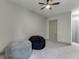Spare bedroom area with cozy beanbag chairs and neutral walls at 4208 Sierra Creek Ct, Hoschton, GA 30548