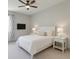 Cozy bedroom featuring a comfortable bed, soft lighting, and neutral decor at 4208 Sierra Creek Ct, Hoschton, GA 30548