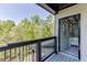 View from the deck looking into a bedroom with a queen sized bed at 4208 Sierra Creek Ct, Hoschton, GA 30548