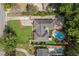 Aerial view of home, yard and neighborhood featuring an in-ground pool at 5641 Roberts Dr, Dunwoody, GA 30338