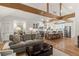Spacious great room with an open floor plan that is enhanced by stylish furnishings and an open kitchen at 5641 Roberts Dr, Dunwoody, GA 30338