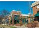 Commercial building showcasing brick architecture and storefronts under a clear sky at 1253 Caroline Ne St # 229, Atlanta, GA 30307