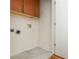 Utility room, white walls and tiled floors at 1253 Caroline Ne St # 229, Atlanta, GA 30307