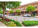 Street view of retail shops with well-maintained sidewalks and landscaping at 1253 Caroline Ne St # 229, Atlanta, GA 30307