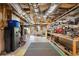 Unfinished basement with exposed insulation and shelving at 1410 Daley Ridge Ct, Lawrenceville, GA 30045