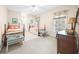 Cozy bedroom featuring twin beds with colorful accents and ample natural light at 1410 Daley Ridge Ct, Lawrenceville, GA 30045