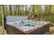 Relax in this backyard hot tub, a perfect addition for outdoor living and entertaining on the property at 1410 Daley Ridge Ct, Lawrenceville, GA 30045