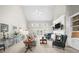 Bright living room with a fireplace, vaulted ceiling and built-in bookshelves at 1410 Daley Ridge Ct, Lawrenceville, GA 30045